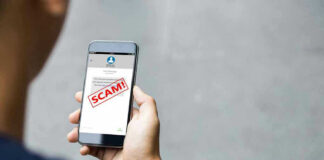 Person reading a scam message on a smartphone