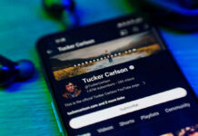 Smartphone displaying a YouTube channel profile page.
