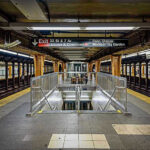Woman Set on Fire in Chicago Transit Nightmare Subway station platform with directional signs overhead.