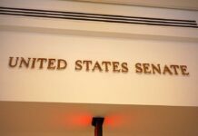 Sign displaying United States Senate in a government building