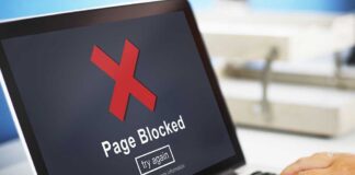Laptop screen displaying a Page Blocked error message