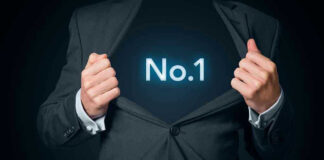 Man opening suit to reveal glowing number one