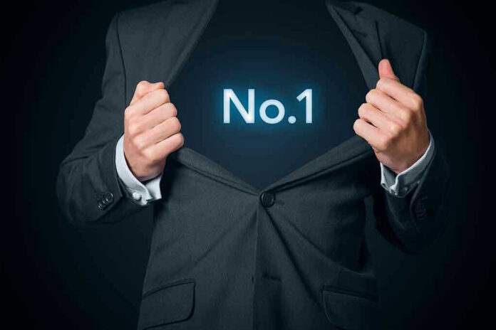 Man opening suit to reveal glowing number one