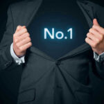 Man opening suit to reveal glowing number one