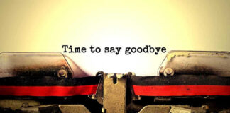 Typewriter with Time to say goodbye text.