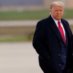 Armed Breach Sparks Mar-a-Lago Gunfire Donald Trump walking outdoors in formal attire