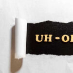 Truck Destroyed — One MILLION Bees Loose Torn paper revealing UH-OH text underneath.