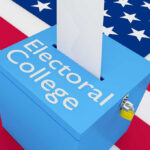 GOVERNOR’S Shocking Electoral College END-RUN Blue ballot box labeled Electoral College with flag.