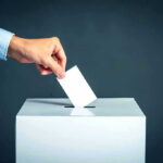 14-Year-Old SHOCKS Vermont — STUNNING Ballot Breakthrough Hand placing ballot into voting box.