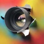Hidden-Camera BUST Sparks SHOCKING Crackdown Camera lens protruding through a colorful background