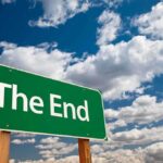 20-Year College Scam CRUSHED — Americans Finally Win A green road sign displaying the words The End against a cloudy sky