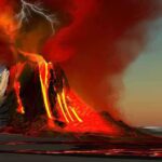 Triple Drone Strike Torches Key Russian REFINERY A volcano erupting with lava and lightning in the sky