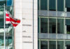 U.S. Securities and Exchange Commission building and flag.