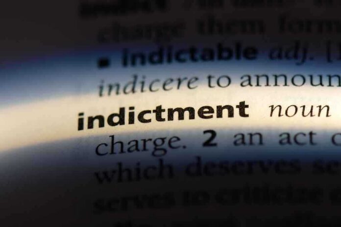 shutterstock_1155452680-2- Close-up of a dictionary page showing the word 'indictment' and its definition