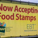 SNAP Fraud Claims Under Scrutiny Yellow sign now accepting food stamps EBT SNAP