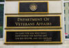 Marine Hero’s Medal of Honor Block Finally Lifted Department of Veterans Affairs building sign with quote.