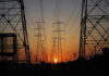 Transmission towers at sunset.