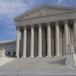 Federal Overreach EXPOSED In Court The Supreme Court building featuring large columns and statues