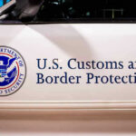 Judge Caught Aiding ICE Escape U.S. Customs and Border Protection vehicle logo and text.