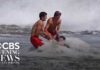 Pair of lifeguards keep young swimmer from being swept out to sea in California
