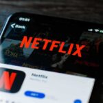 Close-up of a smartphone displaying the Netflix app interface