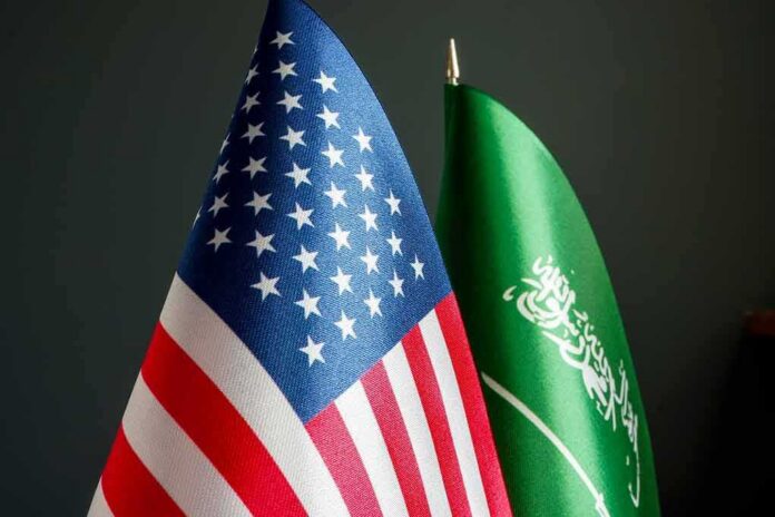 shutterstock_2156698495-1 United States and Saudi Arabia flags side by side