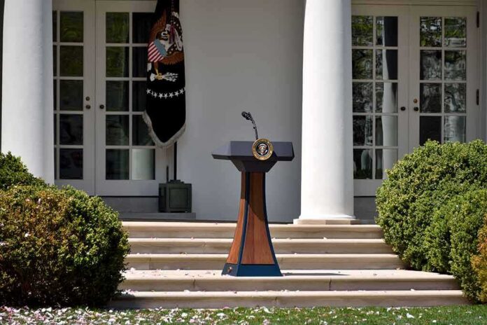 shutterstock_1070010710 Podium with presidential seal in a garden colonnade