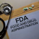 Nationwide Recall Hits Thyroid Pills Over Risk of Excess Hormone FDA document with stethoscope, pills, and pencil on envelope