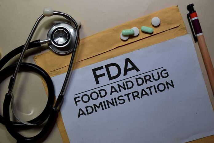 FDA document with stethoscope, pills, and pencil on envelope