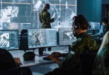 U.S. Quietly Expands Its Security Footprint in Latin America Military analysts at computers in a command center
