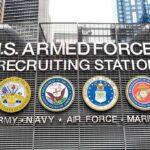 Transgender Troop Ban Faces Court Clash U.S. Armed Forces recruiting station facade with service emblems