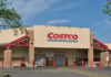 Costco Ends Popular Member Discount Program Costco Wholesale store front with entrance and exit.