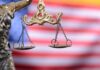 Holdout Juror Breaks His Silence Lady Justice scales with American flag background