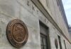 Trump Turns Up the Pressure on Iran U.S. Treasury building exterior with bronze seal on stone wall