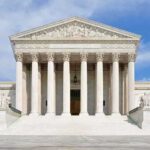 Supreme Court DRAMA — Alito’s MAJOR Abortion Pill REVERSAL! Front view of the Supreme Court building with large columns and steps under a blue sky
