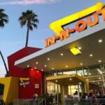 Customer Disarms Woman Threatening Workers In-N-Out Burger restaurant exterior at dusk