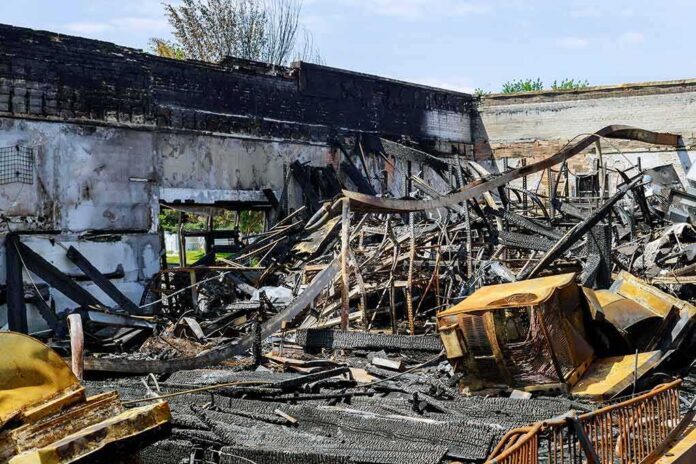 shutterstock_1751557622 Burned building interior with collapsed charred debris