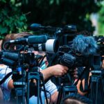 One Dodgers Player’s Decision Turns White House Trip TV news cameras crowding together at an outdoor event