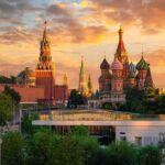 Kremlin Motorcade Sparks Ukraine Peace Buzz St. Basil's Cathedral and Kremlin towers at sunset
