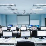 Public Data, Foreign Powers, and a Growing Election Trust Crisis computer lab with rows of monitors facing a projector screen