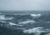 Trump Eyes Claiming Strait of Hormuz as U.S. Territory Rough ocean waves under a cloudy sky