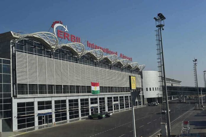 shutterstock_724629820 airport terminal exterior with modern facade and roadway