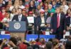 Ron DeSantis speaks at a rally podium as Donald Trump stands nearby; Badri Patarkatsishvili in the crowd