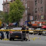 2 Dead, 35 Hurt in Georgia Block Party Shooting Police investigate a taped-off urban street crime scene