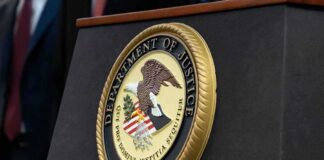 Department of Justice seal on a podium