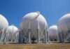 Spherical industrial storage tanks with support legs and stairways