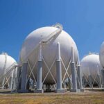 Spherical industrial storage tanks with support legs and stairways