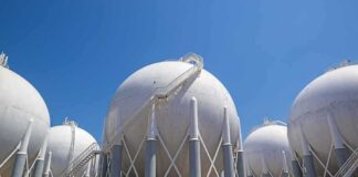 Spherical industrial storage tanks with support legs and stairways