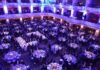 Wedding Dinner Draws Political and Media Elite Ballroom filled with round tables at a formal gala dinner