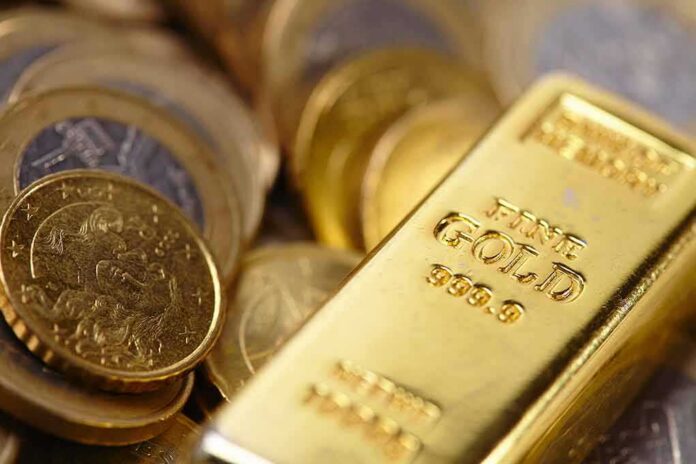 Gold bar and coins close-up